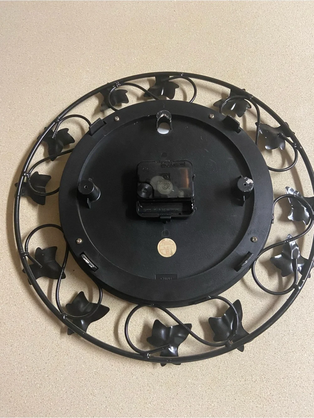 Floral Metal Wall Clock in Bronze